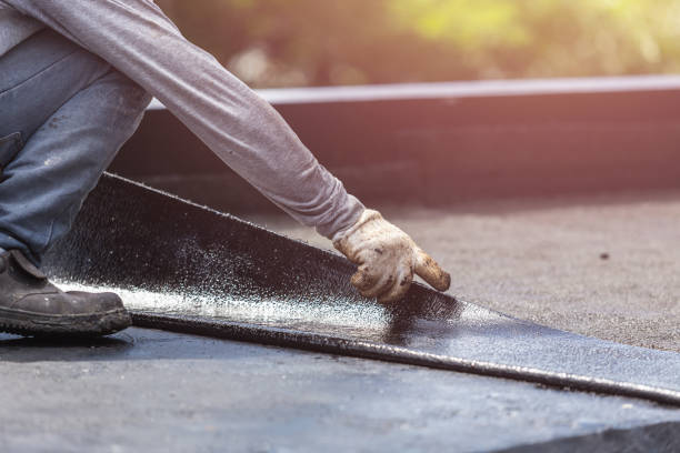 Professional Waterproofing technician working in Bergen, NY